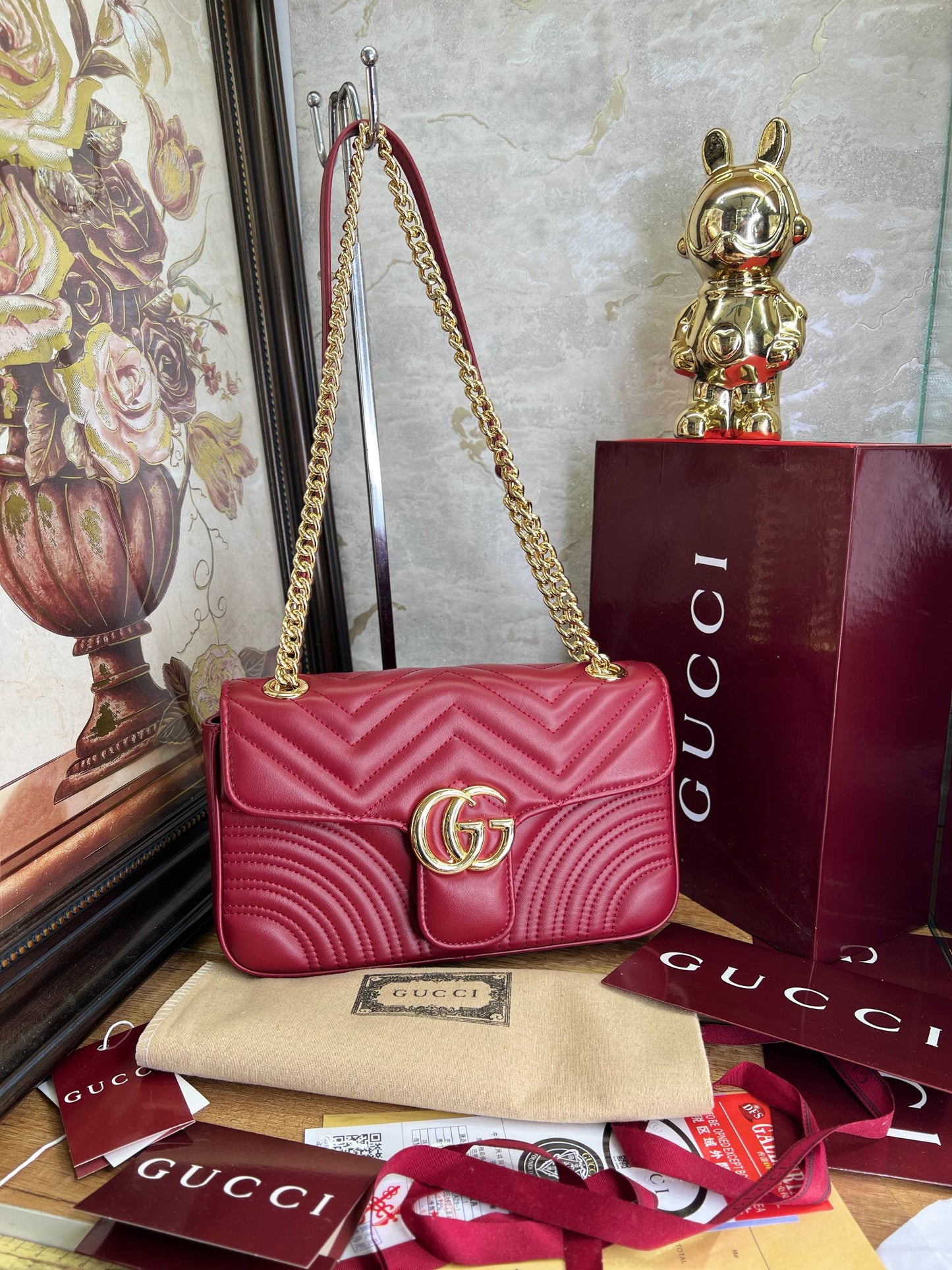 Gucci
Sac bandoulière en cuir GG Marmont Flap