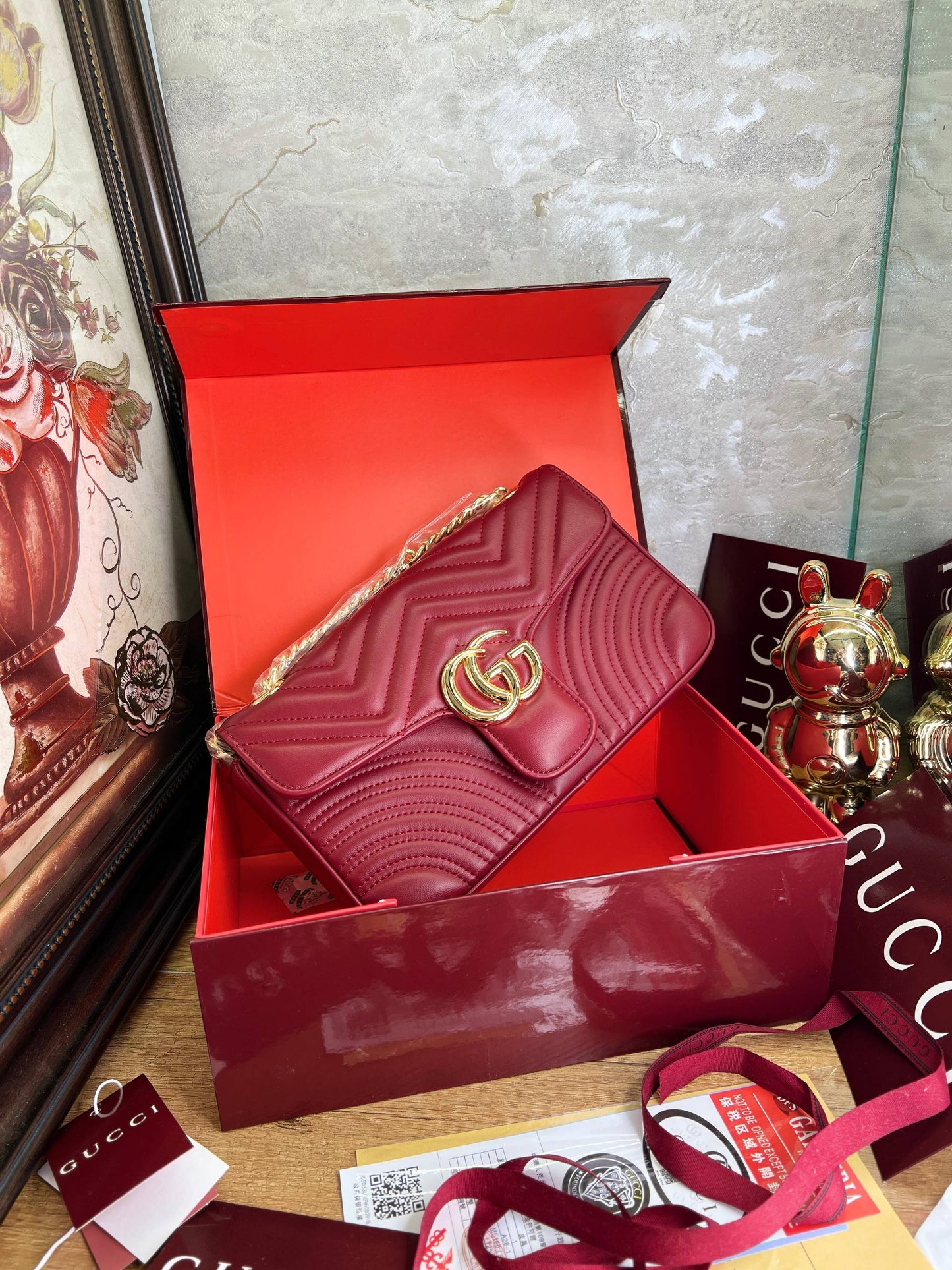 Gucci
Sac bandoulière en cuir GG Marmont Flap